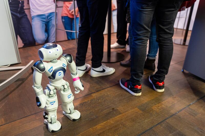 A humanoid robot at the Job Messe career fair in Berlin. Joblessness in Germany rose by 11,000 in February. Bloomberg