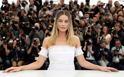 FILE - In this May 22, 2019 file photo, Margot Robbie poses for photographers at the photo call for the film "Once Upon a Time in Hollywood" at the 72nd international film festival, Cannes, southern France. Robbie turns 30 on July 2. (Photo by Vianney Le Caer/Invision/AP, File)
