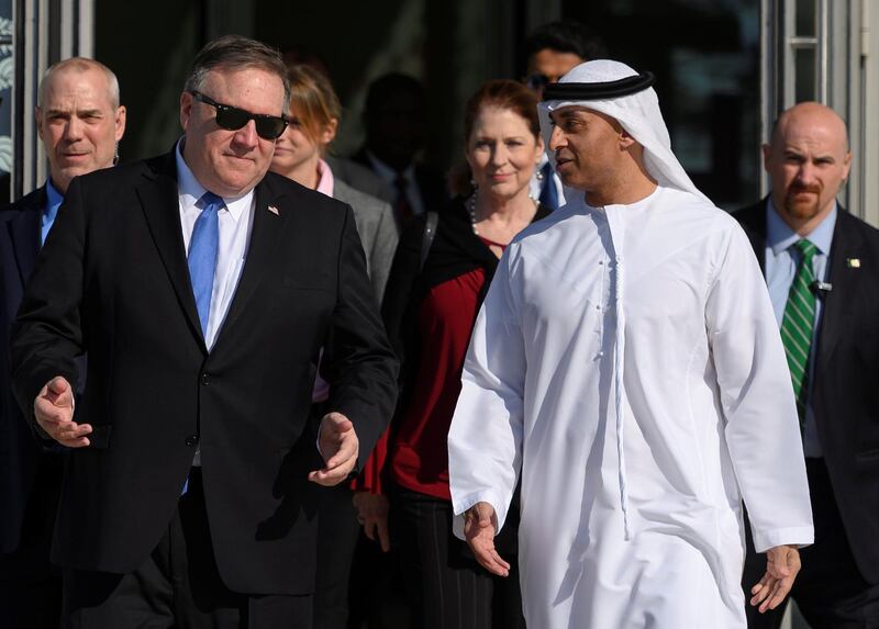 Mike Pompeo speaks with Emirati Ambassador to the US  Yousef Al Otaiba at the NYU Abu Dhabi campus. Reuters