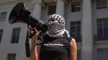 A pro-Palestinian protester uses a bullhorn during a demonstration in front of Sproul Hall on the UC Berkeley campus on April 22, 2024 in Berkeley, California. AFP