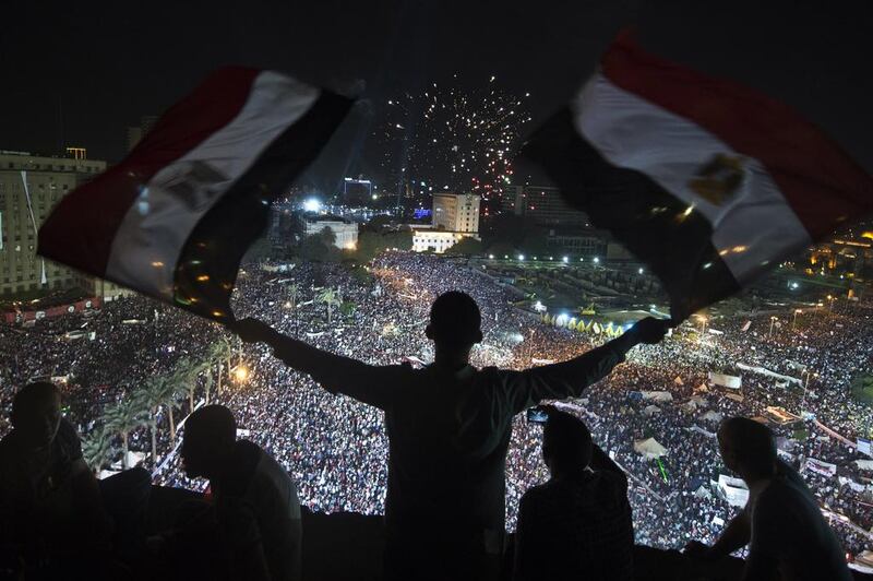 Supporters of Egyptian military chief Gen Abdel Fattah El Sisi rally in Tahrir Square in July, 2013. Khaled Desouki / AFP




