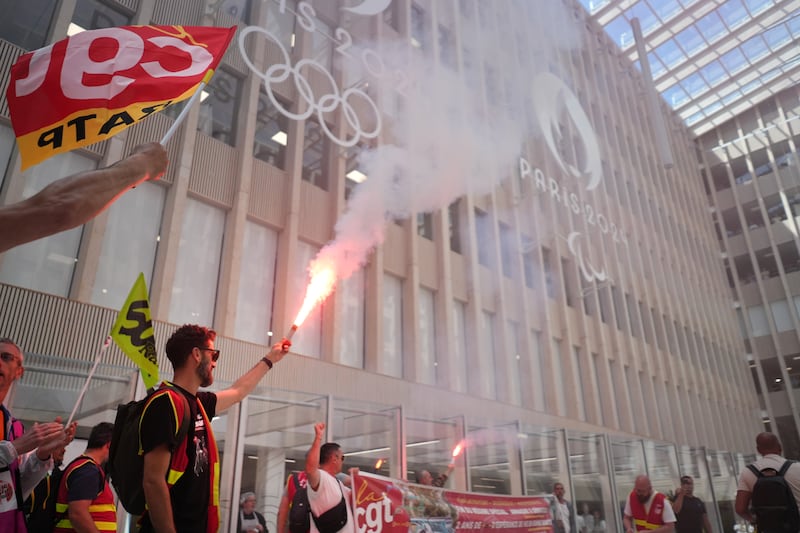 Members of the CGT union protest at the Paris 2024 Olympic Games offices. Getty Images