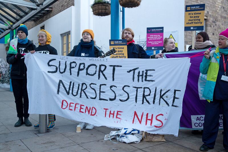 Members of the Royal College of Nursing during a strike outside Great Ormond Street Hospital in London. PA