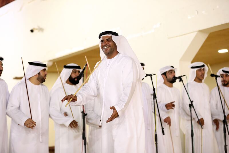 Traditional Emirati singing and dancing on the opening day of the Sheikh Zayed Festival in Al Wathba, Abu Dhabi