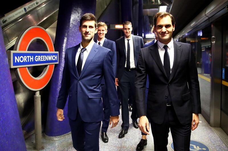 LONDON, ENGLAND - NOVEMBER 09:  (EXCLUSIVE COVERAGE) The eight singles players competing at the Nitto ATP Finals take the Jubilee line on the London Underground from North Greenwich station to Westminster station to attend the Nitto ATP Finals Official Launch presented by Moet & Chandon at London's iconic Houses of Parliament on November 9, 2018 in London, England. (L-R) Novak Djokovic, Kevin Anderson, John Isner, Roger Federer. The tournament will be played 11-18 November at The O2.  (Photo by Clive Brunskill/Getty Images)