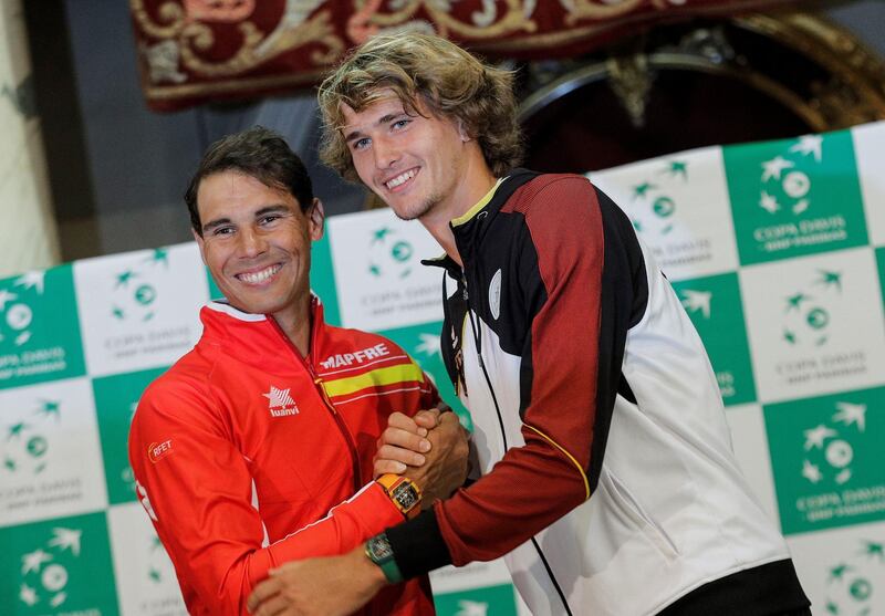 epa06647201 Spain Davis Cup team number one Rafael Nadal (L) and Germany Davis Cup number one Alexander Zverev pose after the Davis Cup draw ceremony for the Davis Cup world group playoffs between Spain and Germany, in Valencia, eastern Spain, 05 April 2018. The playoffs between Spain and Germany will take place from 06 to 08 April at the bull ring of Valencia.  EPA/MANUEL BRUQUE