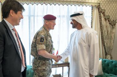 Sheikh Mohamed bin Zayed , Crown Prince of Abu Dhabi and Deputy Supreme Commander of the UAE Armed Forces, greets Lieutenant General Sir John Lorimer, Britain's senior defence adviser for the Middle East on June 25, 2019. Mohamed Al Hammadi / Ministry of Presidential Affairs