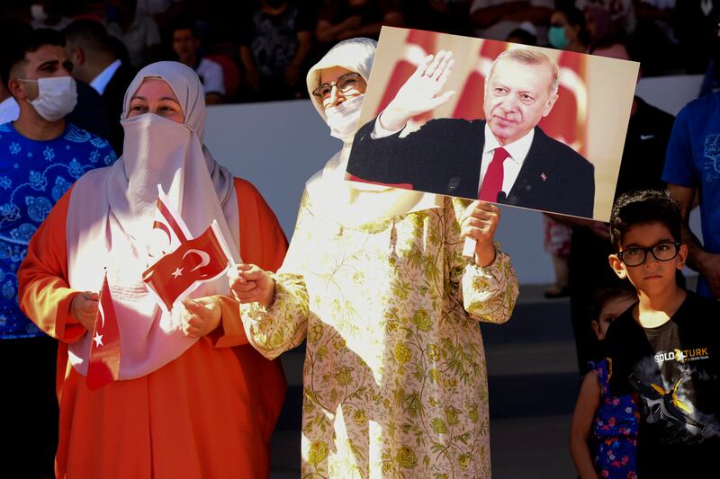 President Erdogan flew into the country's divided capital to mark the 47th anniversary of Turkish troops landing in northern Cyprus. AP