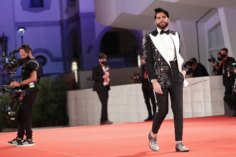 Federico Lauri, aka Federico Fashion Style, attends the red carpet for 'Last Night In Soho' during the 78th Venice International Film Festival on September 4, 2021 in a black sequinned tux. Getty Images