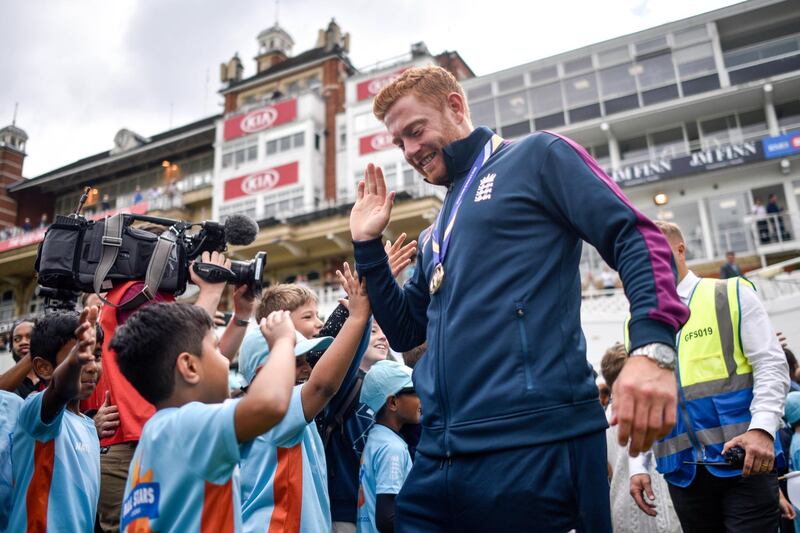 Johnny Bairstow high fives school children during the England ICC World Cup Victory Celebration at The Kia Oval in London, England. Getty Images