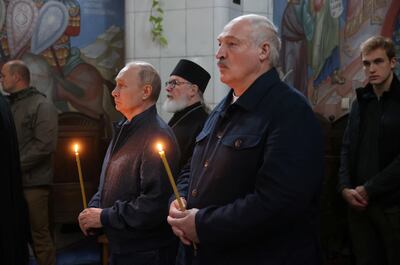 President Vladimir Putin and his Belarusian counterpart Alexander Lukashenko at a monastery in Russia in July. Reuters