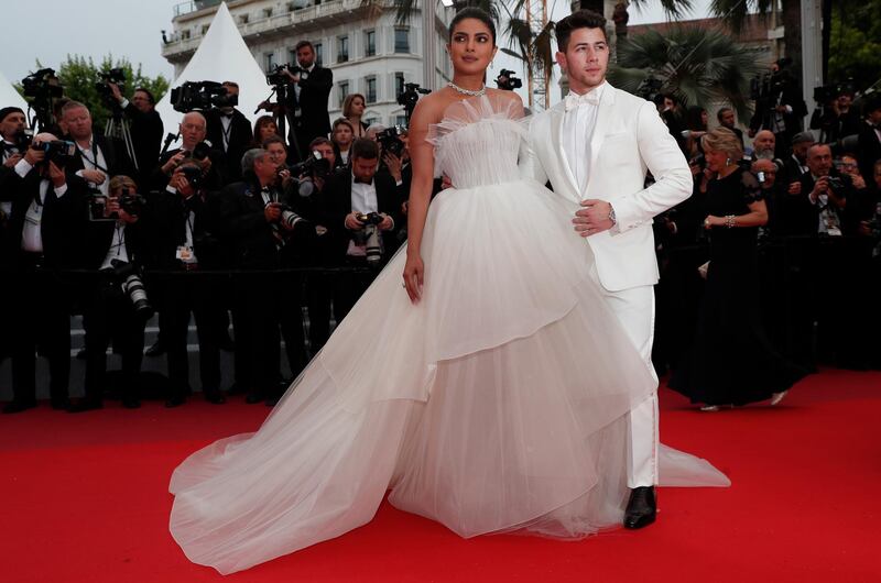 epa07582172 Priyanka Chopra (L) and Nick Jonas (R) arrive for the screening of 'Les Plus Belles Annees d'une Vie' (The Best Years of a Life) during the 72nd annual Cannes Film Festival, in Cannes, France, 18 May 2019. The movie is presented in the Official Competition of the festival which runs from 14 to 25 May.  EPA-EFE/IAN LANGSDON