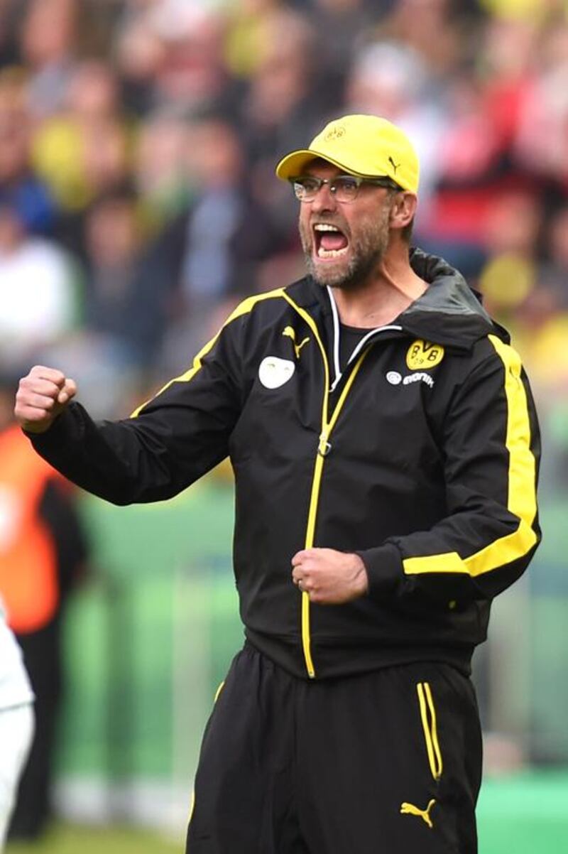 Dortmund's former coach Juergen Klopp could make a return to the league sooner than most expect.  AFP PHOTO / PATRIK STOLLARZ