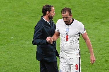 England's Harry Kane shakes hands with manager Gareth Southgate after being substituted against Scotland. Reuters