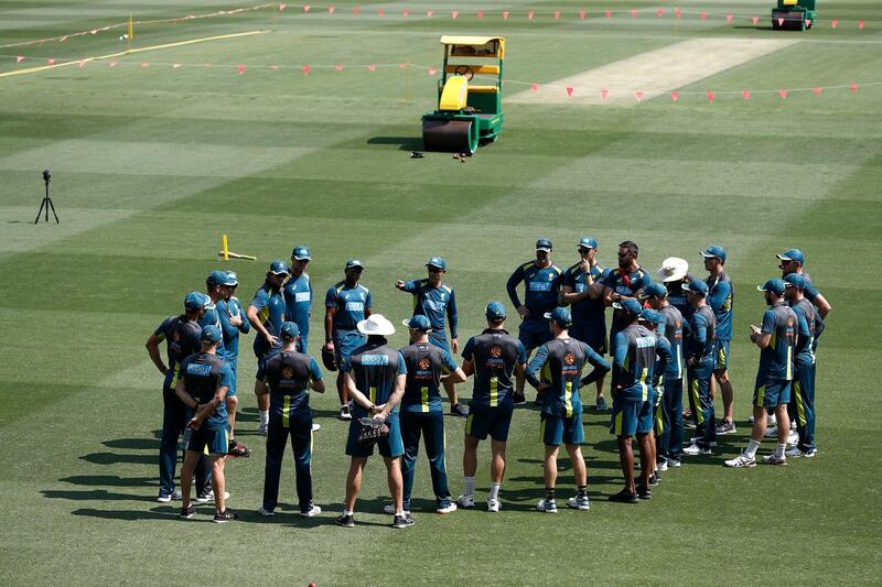 Australia caoch Justin Langer speaks to his players at the Gabba. Getty