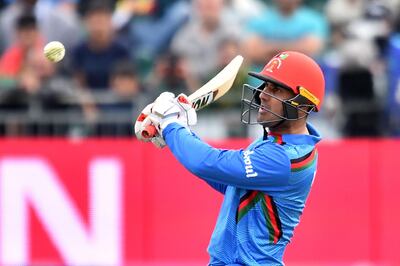 Afghanistan's Mohammad Nabi bats during the 2019 Cricket World Cup warm up match between Pakistan and Afghanistan at Bristol County Ground in Bristol, southwest England, on May 24, 2019. / AFP / Glyn KIRK                  
