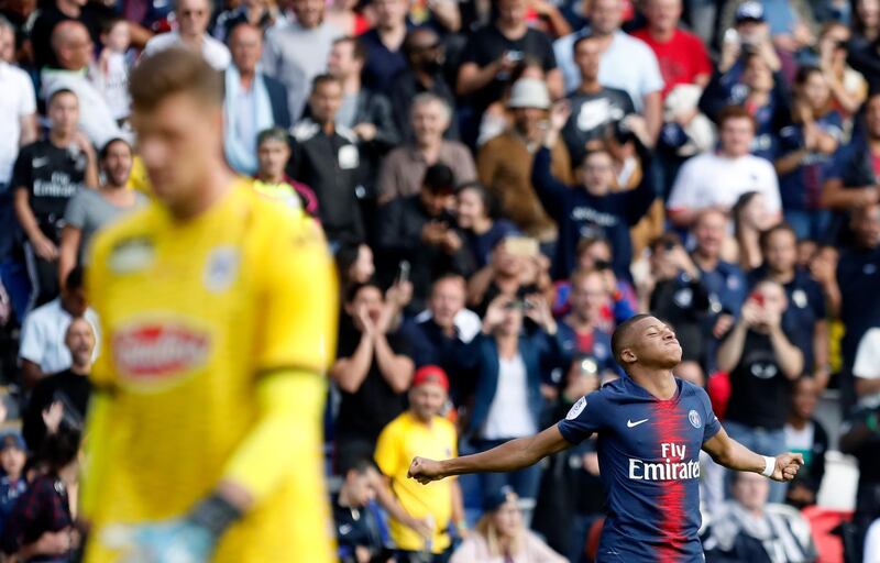 Mbappe celebrates after scoring his side's second goal. AP Photo