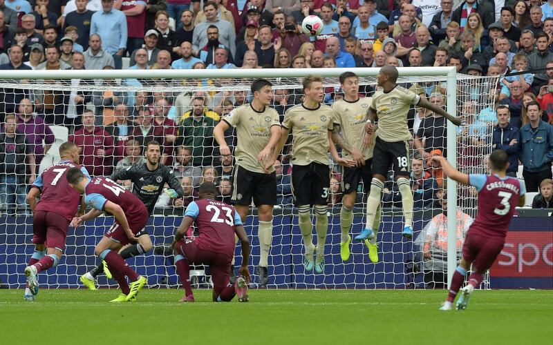 West Ham 's Aaron Cresswell scores their second goal.  EPA