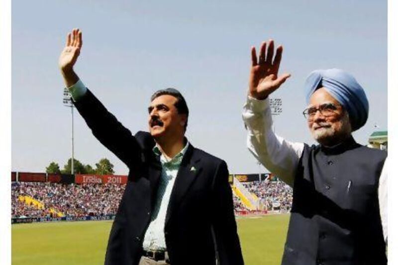 The Pakistani prime minister, Yousuf Raza Gilani, left, and the Indian prime minister, Manmohan Singh, right, at the Cricket World Cup semi-final between India and Pakistan. The news of bin Laden's Pakistan sanctuary came only weeks after Mr Singh's 'cricket diplomacy' initiative with India's neighbour.