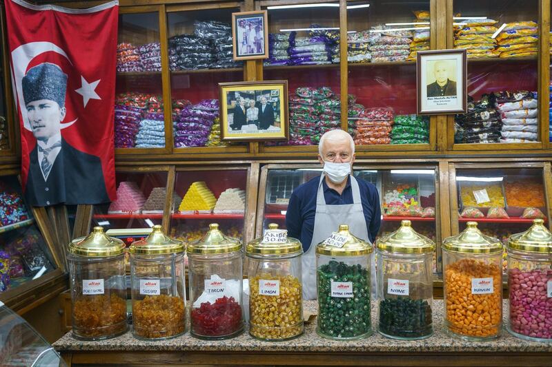 Adem (63) in the candy store. “Altan Sekerleme” works as traditional Ottoman style confectioners. Turkish delight, hard candy, marzipan, cheese sugar, sherbet sugar, halva varieties and Ottoman drinks called sherbets are their main products. 

They still continue to produce boutique traditional production. They make the candies in their own factory. The workshop is on the upper floor of the shop. The shop has been in the same place for over 150 years. In Eminönü Kantarcılar, Istanbul Turkey 2021.