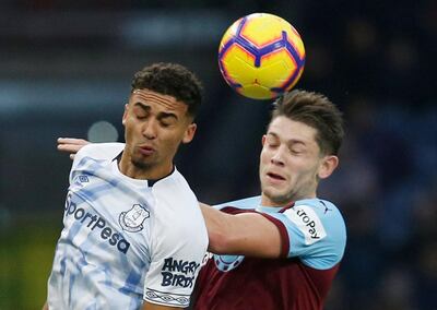 Soccer Football - Premier League - Burnley v Everton - Turf Moor, Burnley, Britain - December 26, 2018  Everton's Dominic Calvert-Lewin in action with Burnley's James Tarkowski   REUTERS/Andrew Yates  EDITORIAL USE ONLY. No use with unauthorized audio, video, data, fixture lists, club/league logos or "live" services. Online in-match use limited to 75 images, no video emulation. No use in betting, games or single club/league/player publications.  Please contact your account representative for further details.