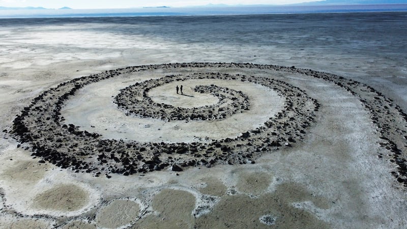 The Great Salt Lake is shown in the background of the earthwork Spiral Jetty by Robert Smithson Tuesday, Feb.  1, 2022, on northeastern shore of the Great Salt Lake near Rozel Point in Utah.  Last year the Great Salt Lake matched a 170-year record low and kept dropping, hitting a new low of 4,190. 2 feet (1,277. 2 meters) in October.  (AP Photo / Rick Bowmer)