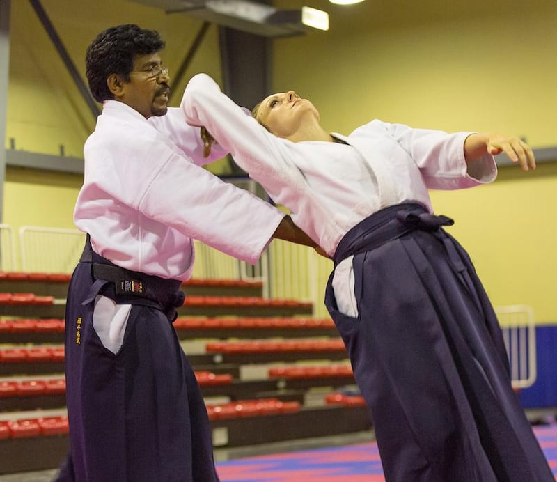 Sugumar John Ratnam, known to his pupils as Sensei John, leads a class at the Zanshinkan dojo (formerly the Aikido Club Dubai) in the Karate Centre Dubai. Clint McLean for The National