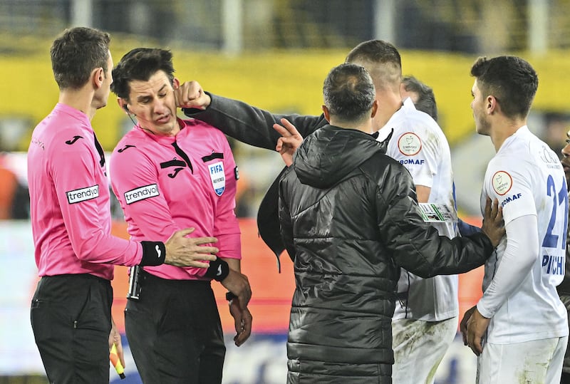 Referee Halil Umut Meler is punched by Ankaragucu president Faruk Koca after the Super Lig match against Rizespor at the Eryaman Stadium on December 11 2023