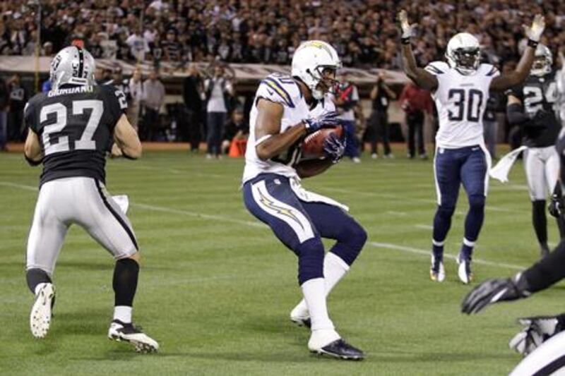 Malcom Floyd catches Philip Rivers' pass for San Diego against Oakland