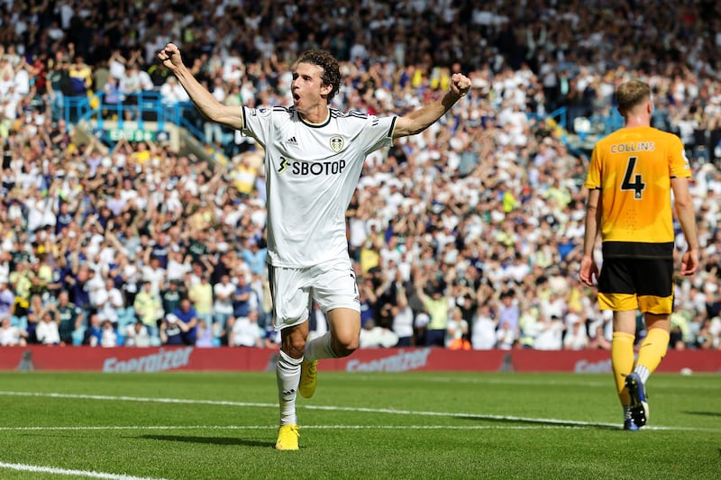Brenden Aaronson of Leeds United celebrates after scoring his team's second goal against Wolverhampton Wanderers at Elland Road on Saturday, August 6, 2022. The goal was later declared to be an own-goal. Getty