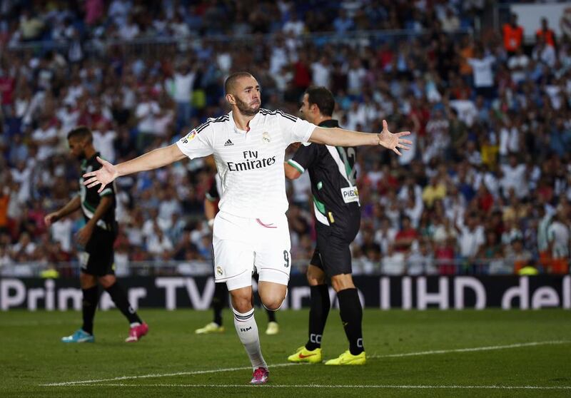 Karim Benzema struck early and Cristiano Ronaldo followed late for Real Madrid on Tuesday night. Sergio Perez / Reuters

