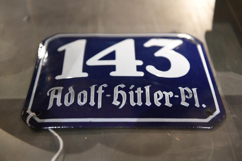 A street sign reading "Adolf-Hitler-Platz" in a cupboard at the auction house Hermann Historica. Reuters