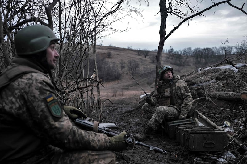 Soldiers of the Ukrainian Volunteer Army hold their positions at the front line near Bakhmut, Donetsk region, on March 11, 2023, amid the Russian invasion of Ukraine.  (Photo by Sergey SHESTAK  /  AFP)