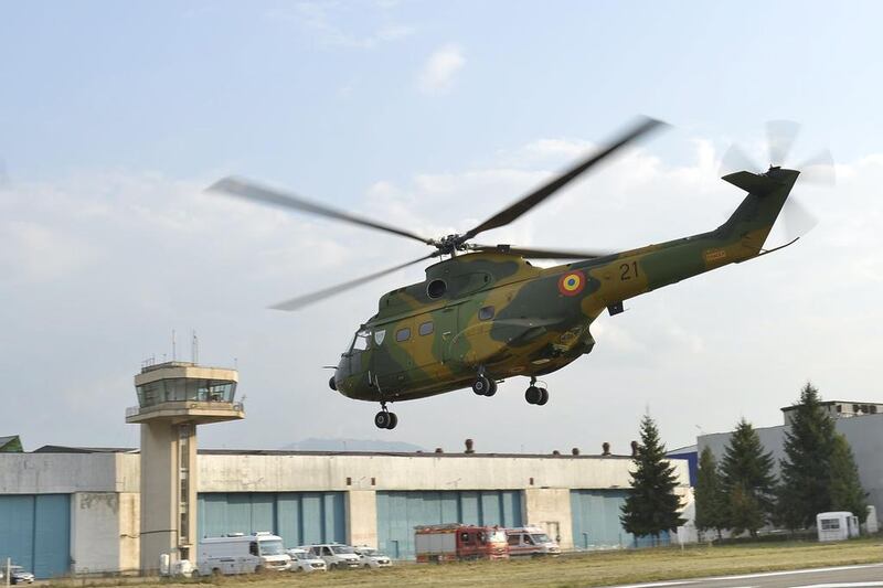 An H215 helicopter at the Airbus Romania Helicopter plant. The aerospace firm is set to axe jobs at its French rotor aircraft unit. Alex Nicodim / AFP

