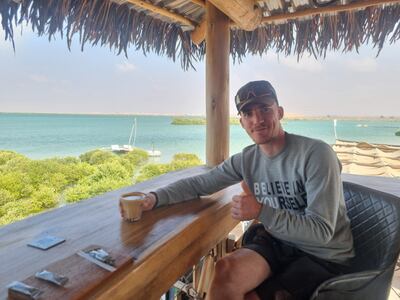 Tomas in the UAE after his epic two-wheeled adventure from India. Photo: Tomas Mac an t-Saoir