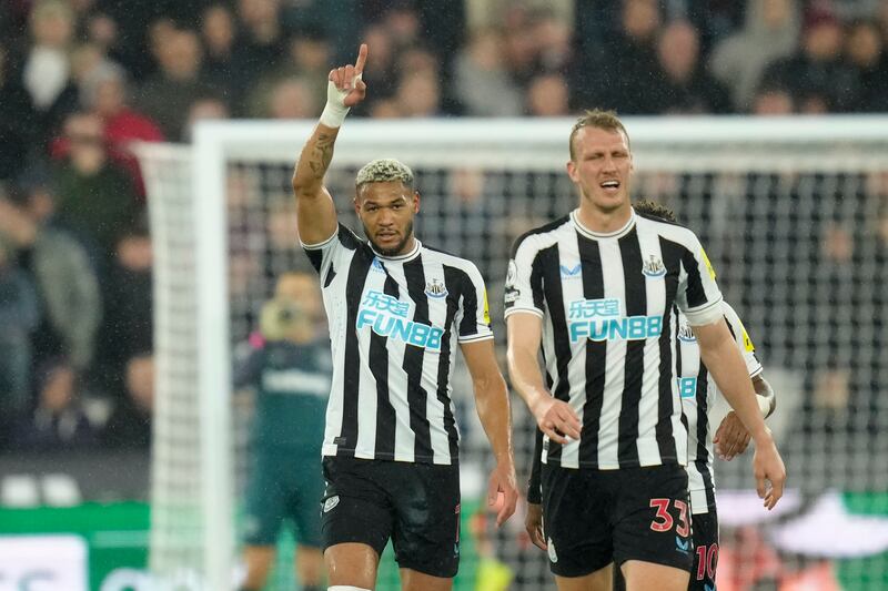 Newcastle's Joelinton, left, celebrates after scoring. AP