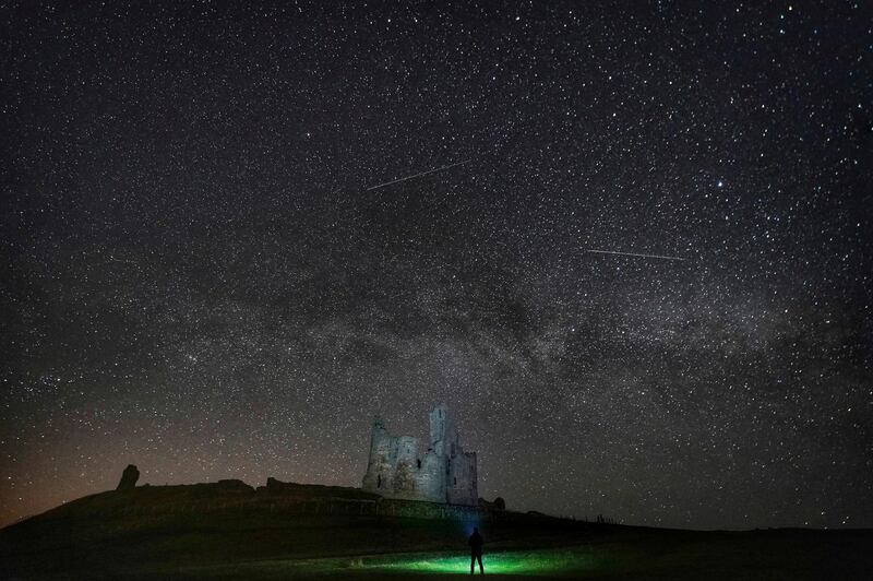 Stars over Dunstanburgh Castle in the early hours of the morning, between the villages of Craster and Embleton, in Northumberland, England. AP Photo