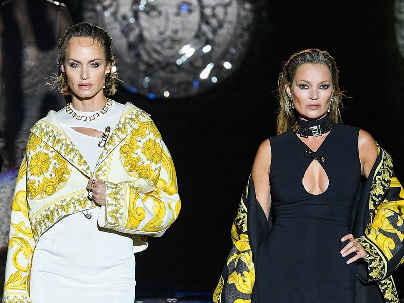 Kate Moss and Amber Valetta model looks from the Versace by Fendi collection. Photo: Versace