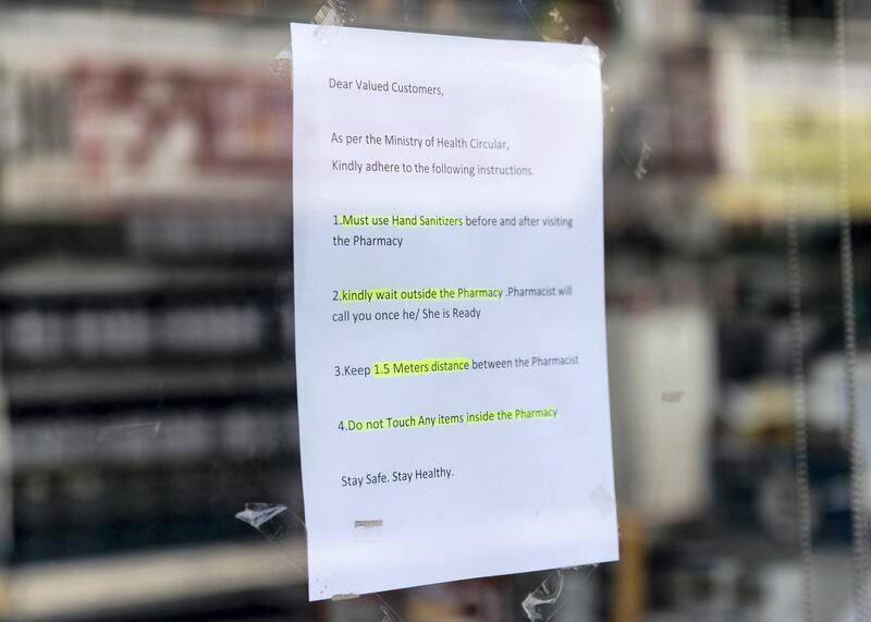 DUBAI, UNITED ARAB EMIRATES. 31 MARCH 2020. 
A sign outside a pharmacy in Bani Yas neighborhood (Photo: Reem Mohammed/The National)

Reporter: NICK WEBSTER
Section: COVID NA 