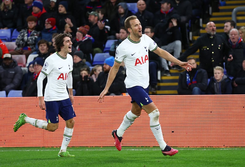Harry Kane celebrates scoring Tottenham Hotspur's second goal with Bryan Gil. Reuters
