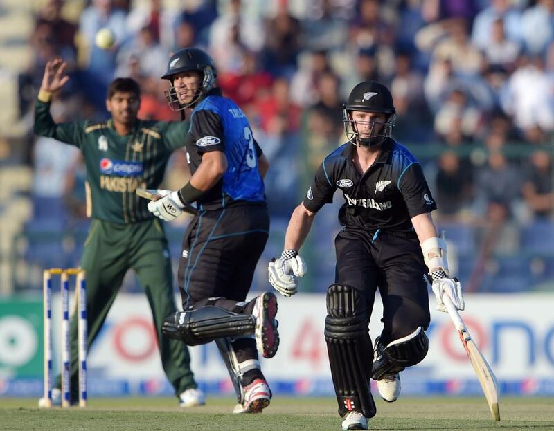 New Zealand captain Kane Williamson, right, and Ross Taylor put on a 116-run stand for the third wicket in Abu Dhabi on Friday. Aamir Qureshi / AFP