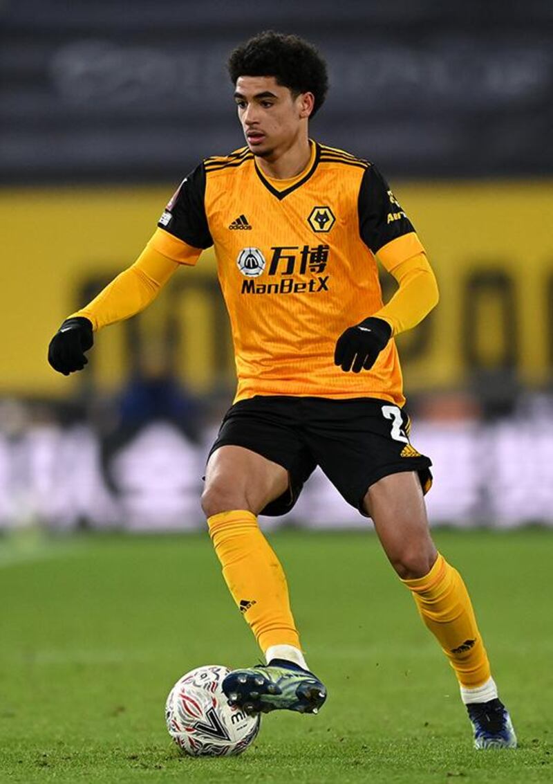 WOLVERHAMPTON, ENGLAND - FEBRUARY 11: Ki-Jana Hoever of Wolverhampton Wanderers controls the ball during The Emirates FA Cup Fifth Round match between Wolverhampton Wanderers and Southampton at Molineux on February 11, 2021 in Wolverhampton, England. Sporting stadiums around the UK remain under strict restrictions due to the Coronavirus Pandemic as Government social distancing laws prohibit fans inside venues resulting in games being played behind closed doors. (Photo by Shaun Botterill/Getty Images)