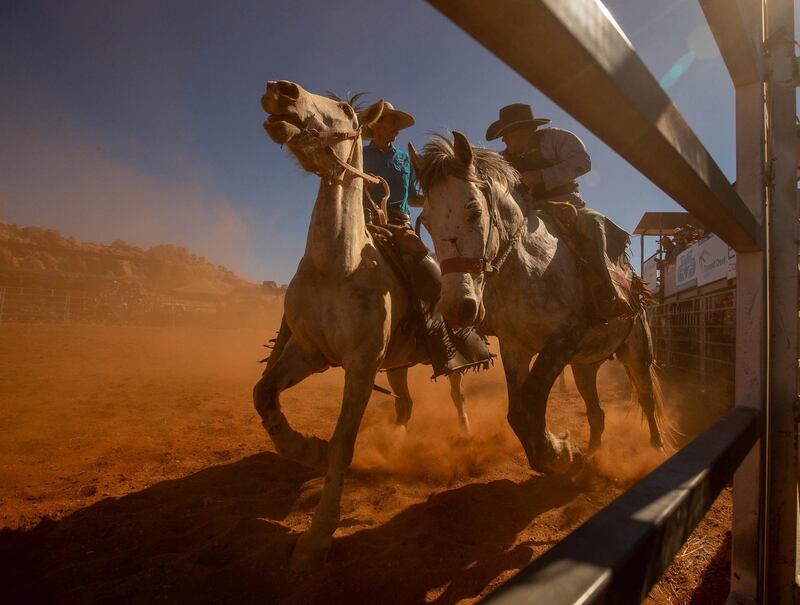 The pick up riders in action during the Harts Range Races and Rodeo. EPA