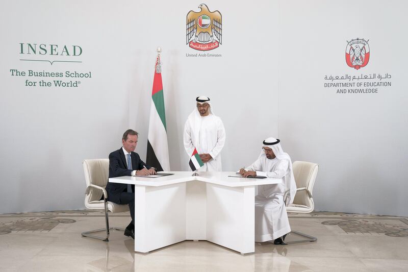 ABU DHABI, UNITED ARAB EMIRATES - October 23, 2017: HH Sheikh Mohamed bin Zayed Al Nahyan, Crown Prince of Abu Dhabi and Deputy Supreme Commander of the UAE Armed Forces (C), witnesses an MOU signing, during a Sea Palace barza. Seen signing on behalf of the department of Education and Knowledge? HE Dr Ali Rashid Al Nuaimi, Director General of Abu Dhabi Education Council and Abu Dhabi Executive Council Member (R), and on behalf of INSEAD, Dr Andreas Jacobs, Chairman of INSEAD (L).

( Hamad Al Kaabi / Crown Prince Court - Abu Dhabi )
—