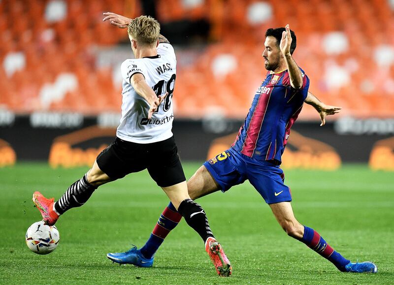 Sergio Busquets 6 - A typical display from the Spaniard as the anchorman transitioned the ball accurately into Barcelona’s key players while breaking up play against Valencia’s attacking moves. Getty Images