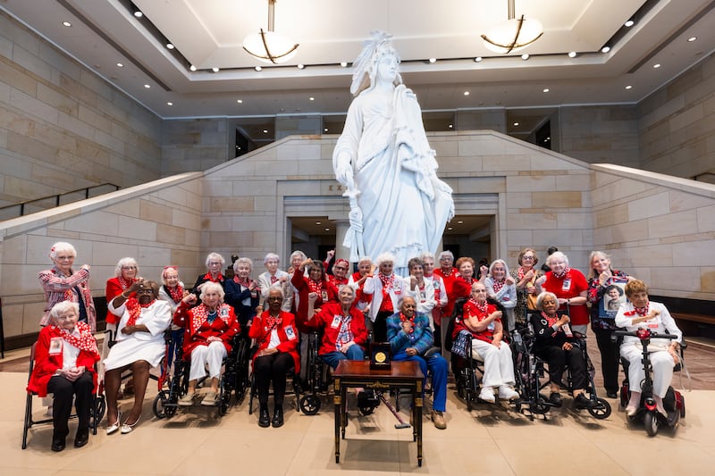 Twenty-eight 'Rosie the Riveters', women who joined the US defence workforce during the Second World War, pose for a photo before a Congressional Gold Medal ceremony honouring their service in Washington, DC. EPA