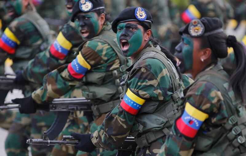 Female soldiers march during a military parade marking the country's Independence Day in Caracas, Venezuela, Wednesday, July 5, 2017. Venezuela is marking 206 years of their declaration of independence from Spain. (AP Photos/Ariana Cubillos)