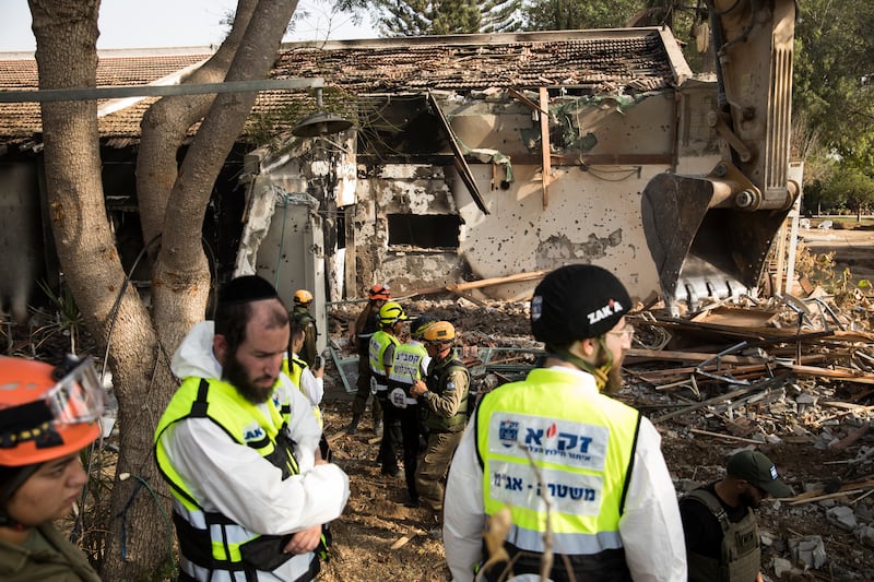 Rescue crews search for bodies after Hamas militants attacked the kibbutz of Be'eri in Israel. Getty Images