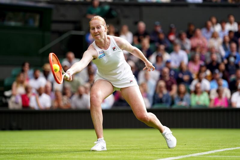 Alison Van Uytvanck in action against Emma Raducanu. PA