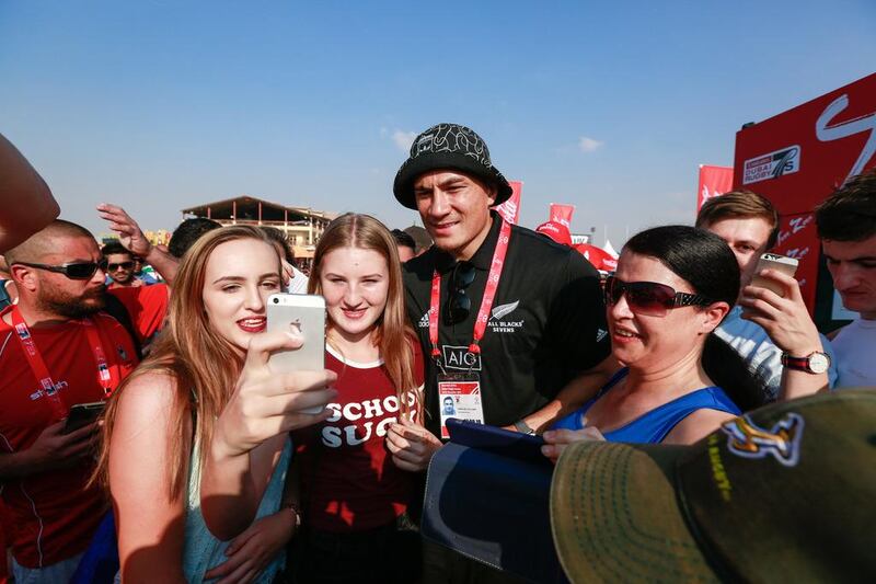 Sonny Bill Williams poses with fans at the Dubai Rugby Sevens in December, 2015,. Victor Besa / The National